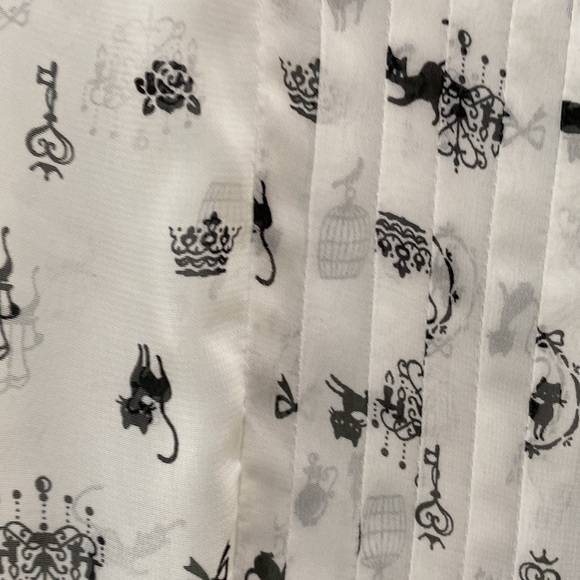 Sheer Keyhole Whimsical Top - Picture 2 of 5